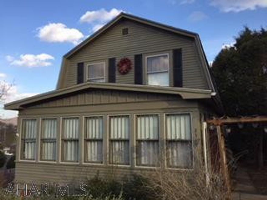 This classic home has original hardwood floors and woodwork. New furnace. Large double lot. Ready to move in.