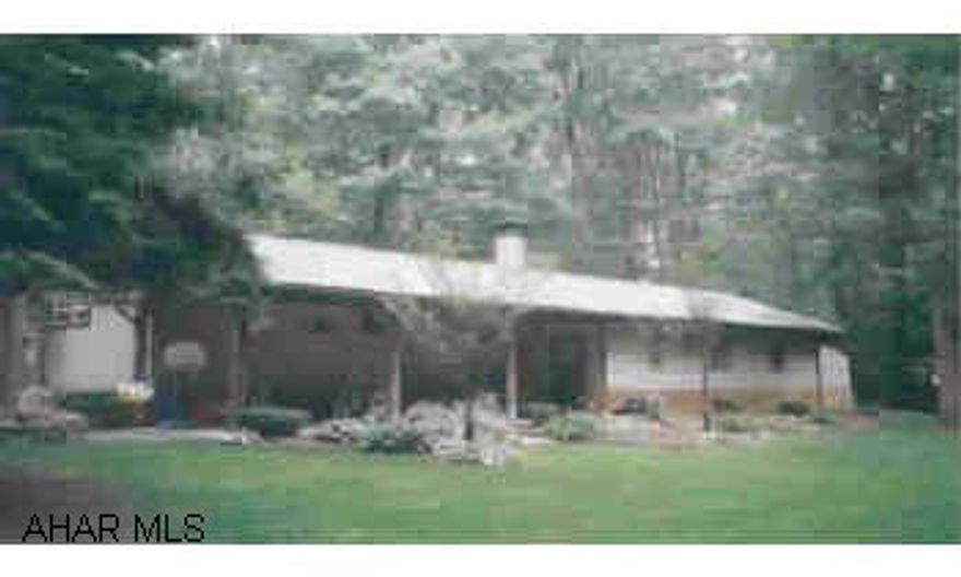 Country living at its finest. This home features a wooded setting, newer vinyl siding, vinyl windows, and newer roof. Private setting with covered patio. Addition includes a nice family room and laundry room. Country living at its finest. This home features a wooded setting, newer vinyl siding, vinyl windows, and newer roof. Private setting with covered patio. Addition includes a nice family room and laundry room.  Electric system - 100 amp