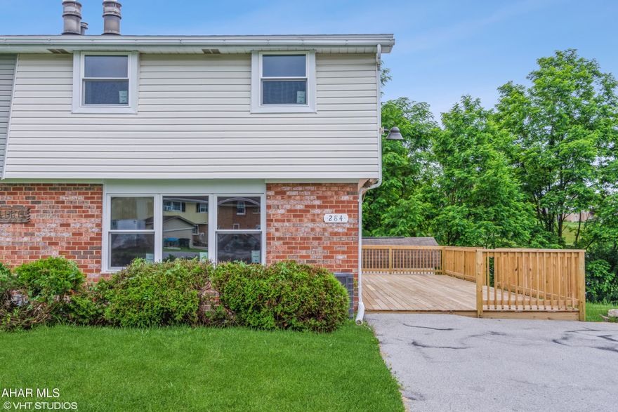 HomePath® has initiated a Multiple offer round which expires on 06-29-2025 11:59 PM E.T. All offers are to go through Homepath.com This is a single family attached home. This home feature new roof, windows and wrap around deck on the exterior. The interior showcases a new eat in kitchen, living room with fireplace and new patio door from the kitchen to access the deck on the first floor. The second floor has three bedrooms with a new full bath. The basement is partially finished with a recreation room and 1/2 bath. The rest can be used for storage or finished at a later time. Very easy access to the basement with a patio walk out. Keep cool in the summer with a new ac compressor. This property is not in the HOA This house is ready to move in  and make your home.