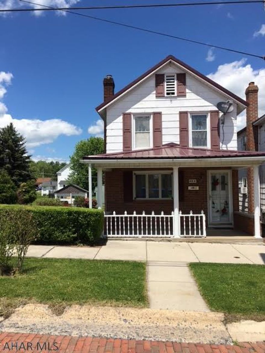 Why rent when you can own. Cute 2 1/2 story home, sits on a red brick street, that offers hardwood floors with eat in kitchen, living room with fireplace, deck, replacement windows, large fenced in yard and a full walkout unfinished basement that could possibly be finished. Front covered porch.