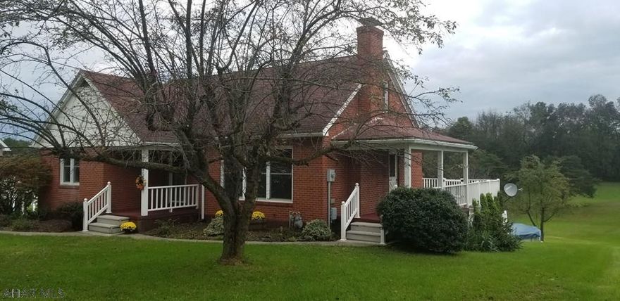 Located within minutes of historic Bedford sits this lovely brick home.  New 2 car garage with cement flooring,  heat and water.  New patio and above ground pool, new deck with timbertech flooring & vinyl railing, new insulation,  new pellet stove in basement, new 10 X 10 concrete pad wired for hot tub (not included), new refinished flooring and new interior first floor paint  make this home a tremendous value.  Enjoy natural gas heat and a view on your back porch and pool area that will impress!