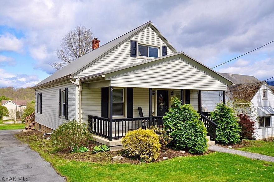 Wow! This adorable little cape style home is beautifully decorated and ready for you! New kitchen, new luxury plank flooring, like new carpet, exterior is nearly impenetrable with hearty vinyl siding and metal roofs. Upstairs is heated and can be used as large bedroom or anything at all. Full unfinished basement, oil hot air heat, pellet stove in basement is included, off street parking, nice back yard, front and rear covered porches, quiet street in a quiet little town. Low low taxes. A beautiful and affordable place to call your own!