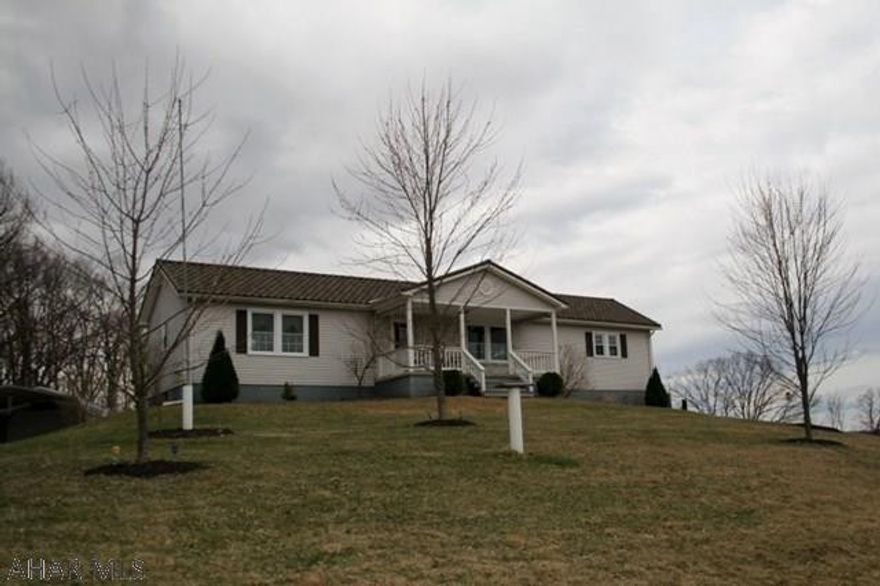 Custom built, ranch style home on 10 open acres with a stunning view of the mountains. Several fruit producing trees and a garden to supply you with your own fresh foods. An abundance of wildlife can be seen while you sit on your back deck. The house has beautiful hardwood floors and an electric, hand laid stone fireplace in the living room. Large, thermo-pane windows provide plenty of natural lighting throughout the home. The walk-out basement has its own kitchen and bedroom/office area. Many custom features. A must see property!!