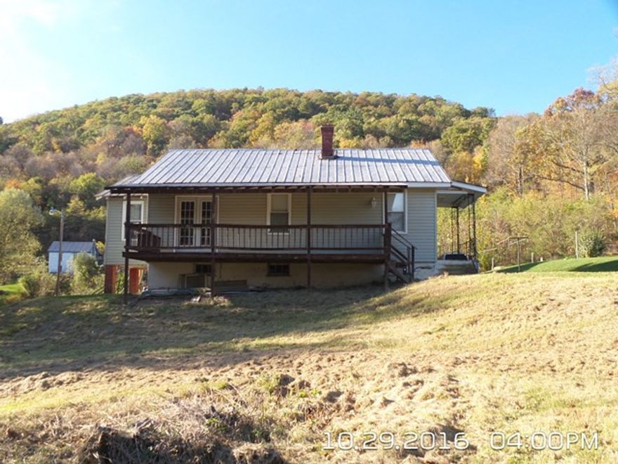 Adjoins State Game Lands!!  Don't miss this great opportunity to hunt "in your back yard"!  This 2-3 bedroom ranch home sits on 2.51 acres and you can walk out the front door, across the yard to the State Game Lands!  Cash only purchase due to no utilities being on.