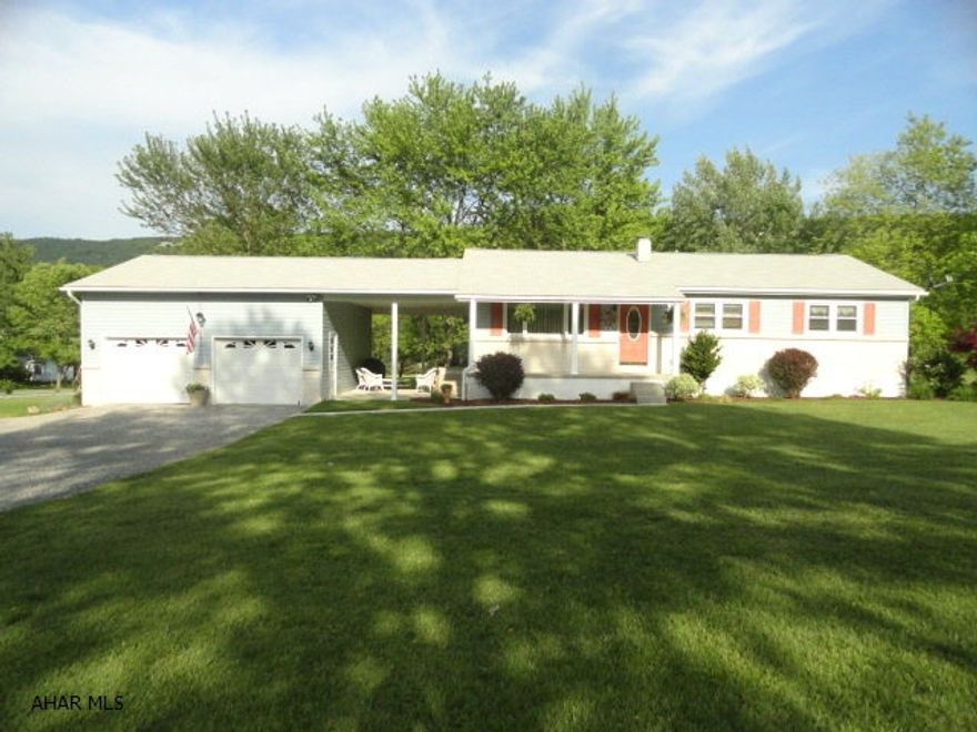 3 BR 1.5 bath, Immaculate Ranch home with Att. 2 Car garage and 15' x 28' concrete floor breezeway. New vinyl siding in 2012. Newer Oak kitchen. Partial finished basement with wall propane gas heater and woodburner. 10 x 14' shed.  Full one acre lot in beautiful West Loop Valley. New tile, vanity and vanity top in basement is inculded in sale. Owners bought for main bath but never installed. Recent water test attached under documents. Only 5 minutes from Hollidaysburg and 15 minutes to Logan Town Centre. Original owners.