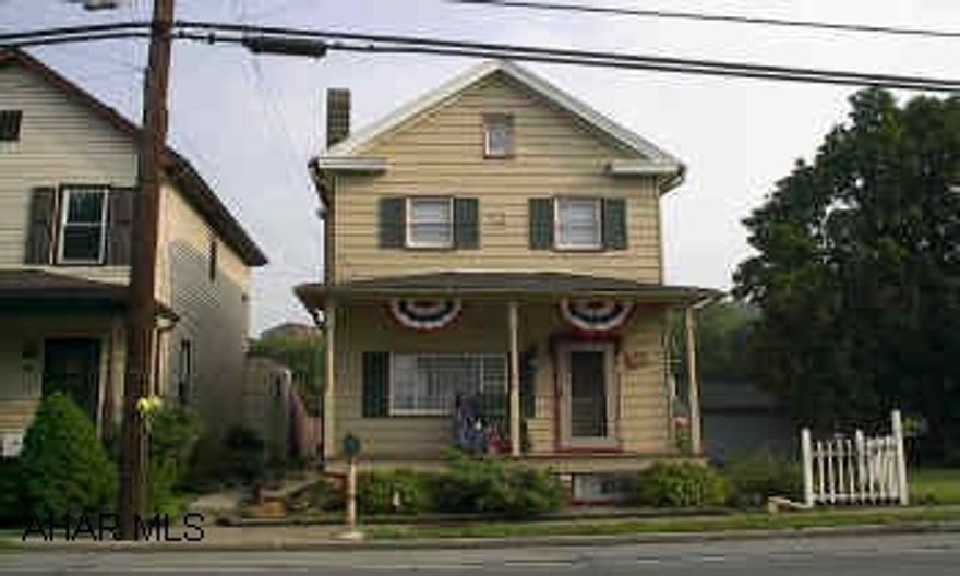 Lovely 2-Bedroom with so much charm, newer carpets, Gas Fireplace, Newer Cover Deck & So Much More!!