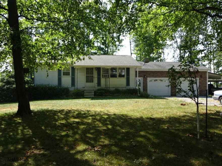 Nice home in the country. Private setting. Two car garage, 1 Car carport. Large storage shed.