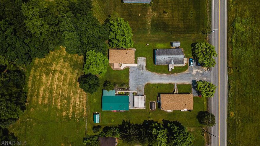 Beautiful 3 bedroom, 2 bath Mobile Home. Very nice. Country feel. There are currently 3 lots that are currently rented out for $305.000 each. $915.00 income coming in every month. Carport is 18x20. Shed 10x14.