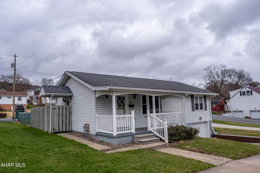 This charming one-story ranch-style home offers comfortable living with two bedrooms, a spacious living room, and a  eat-in kitchen perfect for family gatherings. The versatile dining room can easily function as a third bedroom, providing flexibility for growing families or guests. Hardwood floors flow throughout the main living areas, adding warmth and character, while central air ensures year-round comfort. An unfinished basement offers ample storage or potential for future expansion. A one-car integral garage provides convenient parking and shelter from the elements, and the fully fenced backyard creates a private oasis for outdoor enjoyment. Schedule your tour today.