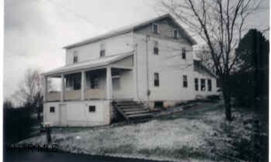 Cozy farmhouse boasting lovely mountain views in Snake Spring Valley. Newer windows, well and vinyl siding. Walk-up attic, grape arbor. Home Warranty