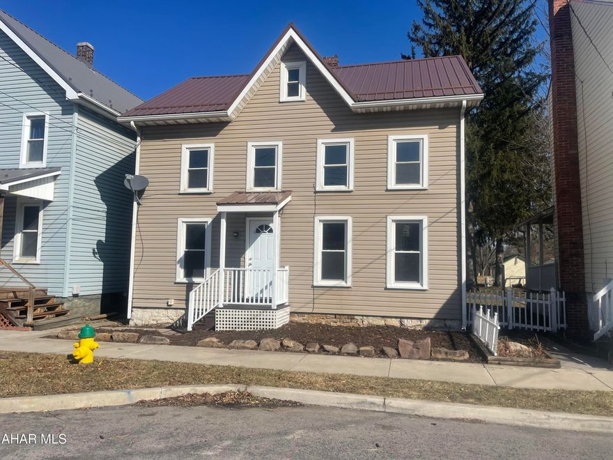 Completely remodel 2.5 story house in Hollidaysburg Borough. The older house was brought to life with mordern charm. The front of the home is ready for you to plant your flowers! Walk through the front door to a spacious living room that opens into the dining area. Half bath on first floor. Take a look in the kitchen at these classic white cabinets! The gray hardwood looking vinyl luxury floors tie these rooms together. 3 bedrooms are feature on the second floor with all spacious closets. Linen closet! Now walk into this bathroom that also has your laundry! Double doors to a large deck to overlook your yard. Shed! NEW ROOF! NEW FURANCE! AC! NEW HOT WATER TANK! This is a must see in HASD! Foot of Ten Elementary School.