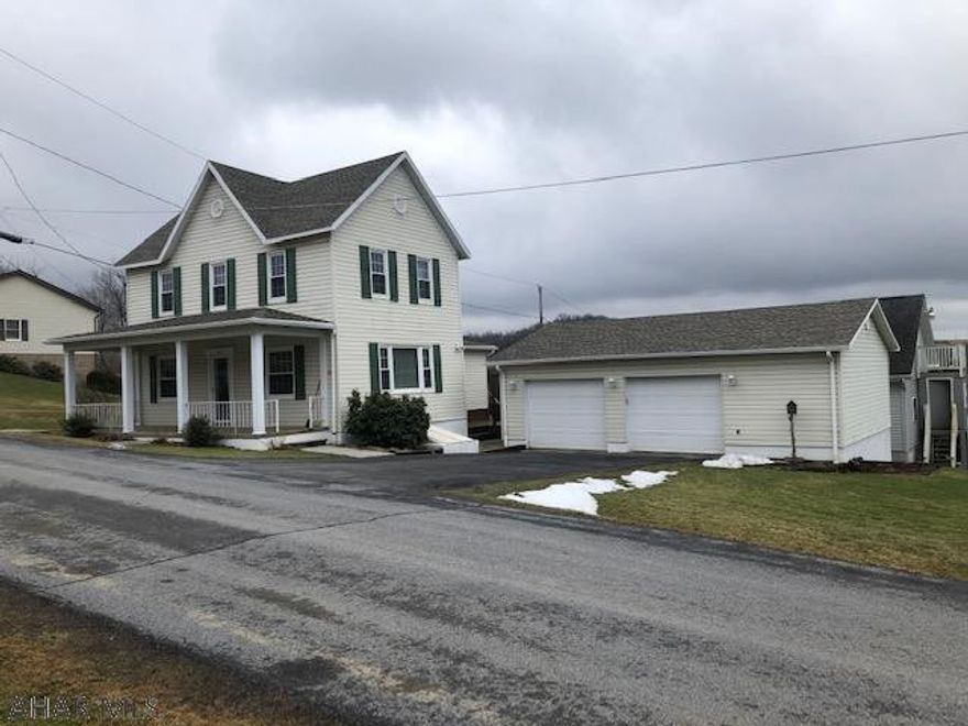 2 story remodeled, spacious home with newer windows, 2019 architectural roof, 2+ car garage. House has Oil& Hard Coal Heat.