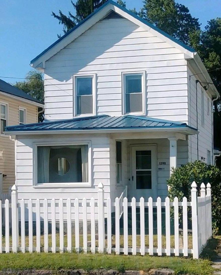 Looking for a beautiful 2 bedroom 1 bath home with a white fence look no further. With an upstairs office that could possibly be bedroom number 3.  This home has so much to offer and PRICED TO SELL.