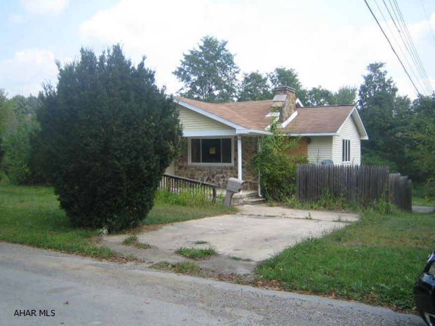 Large 1 story Juniata home in need of major TLC throughout. Loads of potential with large addition that could be converted to multi-family dwelling with some work. Large rear addition with indoor in-ground pool in need of complete overhaul. Property is being SOLD AS-IS.