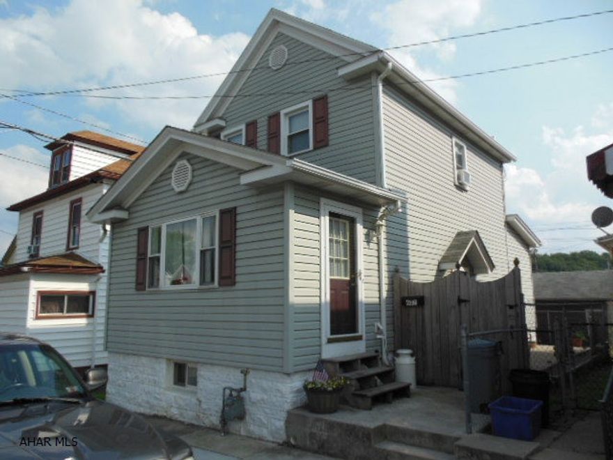 REDUCED!!  Nicely updated, 2 story in Juniata. New carpet, pergo flooring, appliances, window A/C, laundry on 1st floor. Large & beautiful oak kitchen, updated bathroom, private patio in rear and low, low taxes! YOU MUST SEE INSIDE! Very easy to maintain! Newer furnace, electric panel, pex water lines and service (copper from the street), insulated windows even in basement. Handy to Altoona Campus of Penn State, local shopping, hospital & pharmacies, food vendors, mechanics, etc..  Heat avg $74/mo.  *Way better than renting!!  Don't wait!