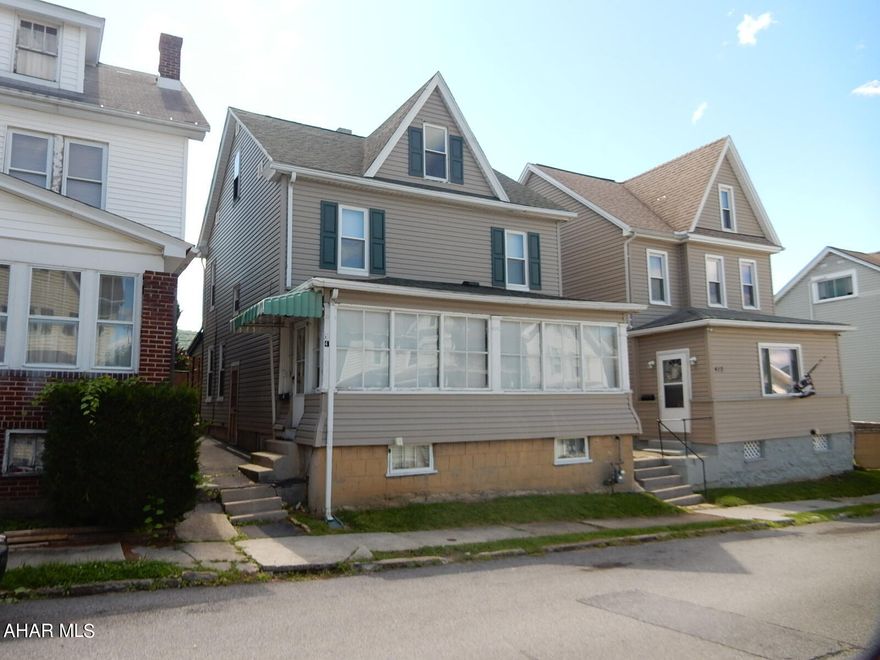 Nice Home on Walton Avenue 2.5 Story Vinyl Siding with detached garage. 3 Bedroom, Features, minor updates with living room, dining room, kitchen and 1/2 bath on the 1st floor. 1 full bath and 3 bedrooms on the second floor with finished  attic.