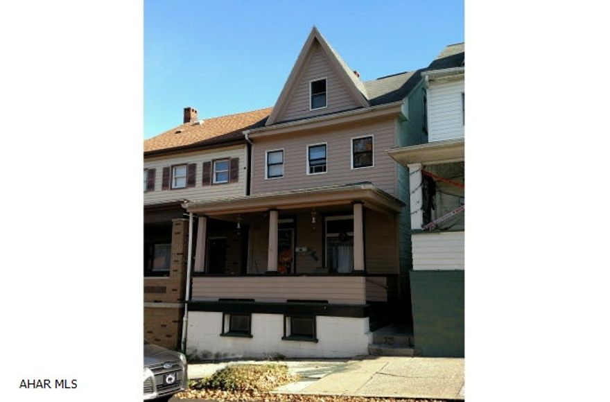 3-4 bedroom home with updated bath & kitchen. Formal dining room, finished 3rd floor. Partially fenced yard. Nice opportunity!