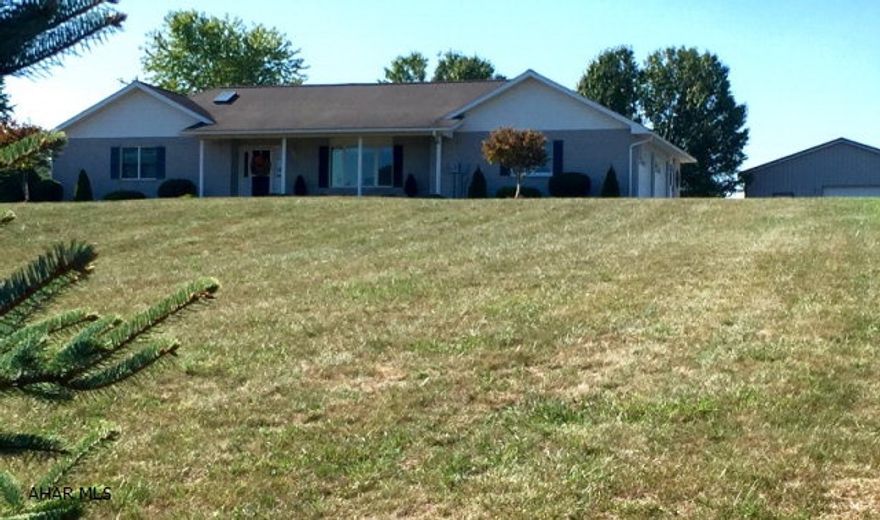 This much sought after meticulously maintained brick ranch located on 2 scenic acres is a rare gem. No detail was overlooked in this fabulous renovation. This is truly one story living at its best. From the moment you enter this home, it is obvious that the homeowner has spared no expense in making this home unique. Quartz countertops, stainless steel appliances, new flooring, custom design elements and the main floor laundry room make this home wonderful. Two beautifully renovated bathrooms add to the appeal. A 2 car garage adds convenience while the huge 32' X 40' garage makes an ideal workshop. The breathtaking views that surround the home make this an amazing value. Within 5 to 10 minutes of historic Bedford.