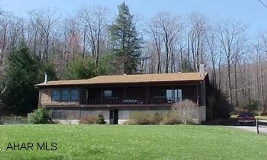 Beautiful Raised Ranch on almost 14 acres.  Beautiful private setting.  Newly remodeled bathrooms with ceramic tile, covered front patio/walkway, 2 ponds, 2 level deck, office in basement has separate entrance, berber carpeting Beautiful Raised Ranch on almost 14 acres.  Beautiful private setting. Newly remodeled bathrooms with ceramic tile, covered front patio/walkway, 2 ponds, 2 level deck, office in basement has separate entrance, berber carpeting new hot water tank, wooden fencing.