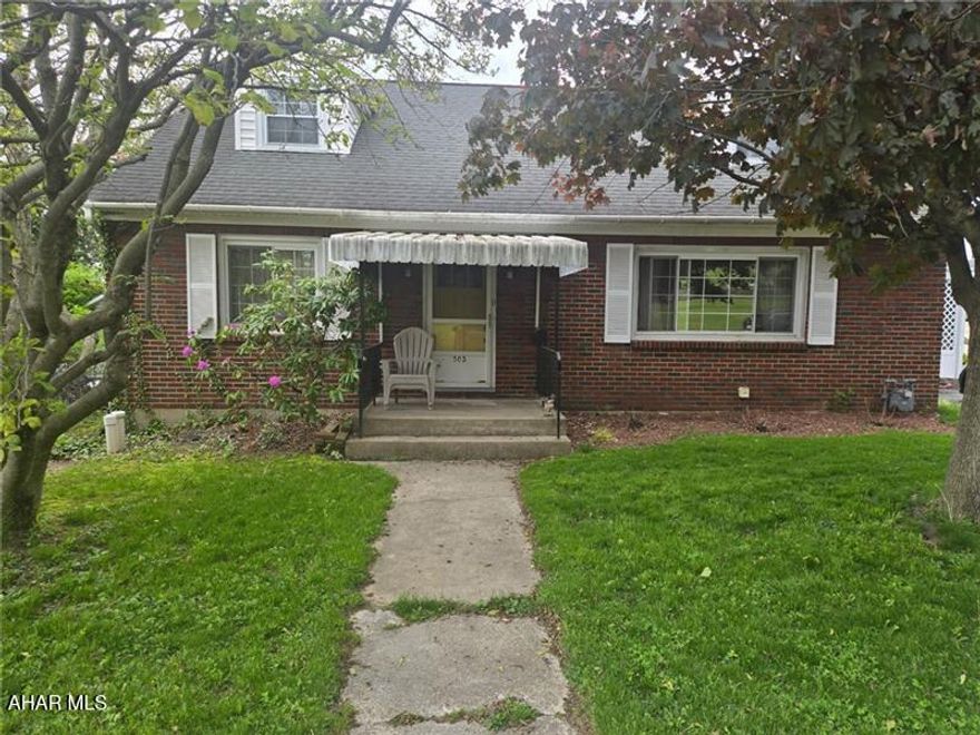 This classic 1-1/2 story brick home is just waiting for the new owner to move in and enjoy the central A/C when the summer heat finally arrives. It offers a paved driveway with an enclosed carport that could easily be reopened; along with a detached garage accessible from the alleyway. The large flat yard provides plenty of space for outdoor activities year-round! Inside you'll find a wonderful living room with large windows for tons of natural sunlight along with a wood fireplace surrounded by a brick surround. The kitchen is directly off of the carport for convenience and offers plenty of cabinetry along with a cute passthrough opening into the dining room. Two of the bedrooms and a full bath can also be found on the main floor; while the master bedroom with it's own full en suite bathroom is located on the second floor. You'll absolutely love the hardwood floor and the privacy up there. The basement offers so much flexibility and functionality with its finished family room area, separate laundry room, and even a workshop! Don't miss your opportunity with this ONE!