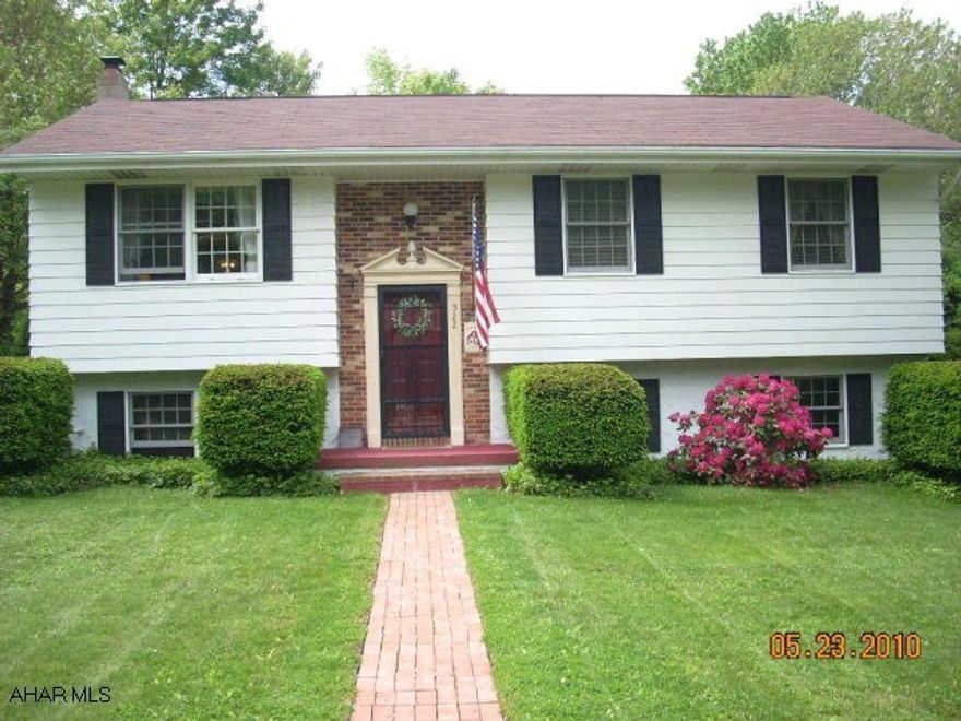 Beautifully maintained 3 bedroom, 1.75 bath home on large, shady lot in quiet neighborhood. New carpet & detailed crown moulding in living room, dining area opens to bi-level deck & large private yard. Kitchen is open to dining & living areas. Family room has wood burner & newer 3/4 bath. Integral garage with lots of room for storage. Home warranty included.