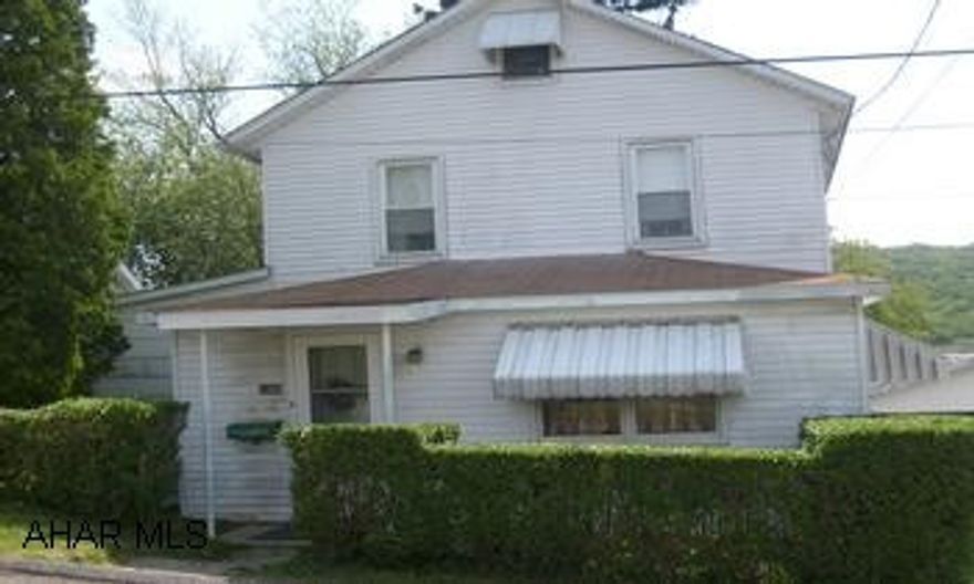 REDUCED PRICE INCLUDES $2000 CLOSING COST ASSISTANCE. 2 story aluminum house on double lot with a detached garage and 1 carport. Agent is related to seller.