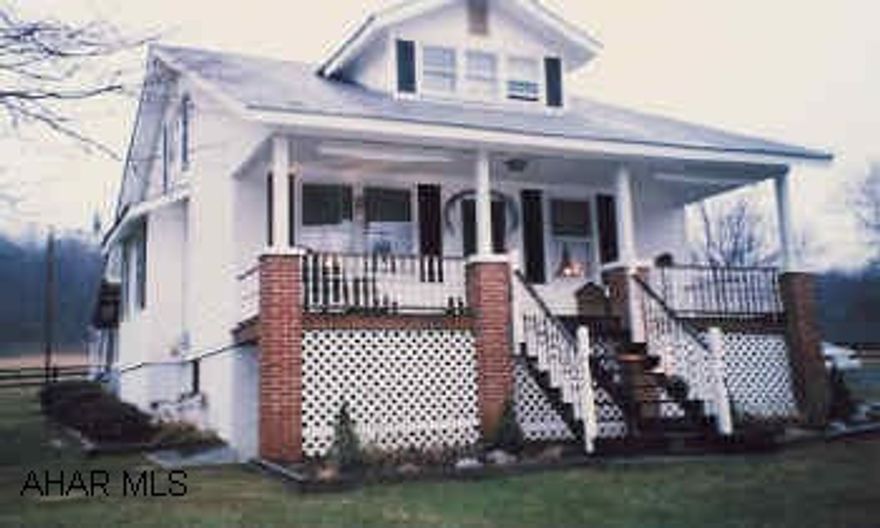 Updated 1.5 Story vinyl sided with 2 story barn and 2 car garage with workshop. Large yard and peaceful setting.