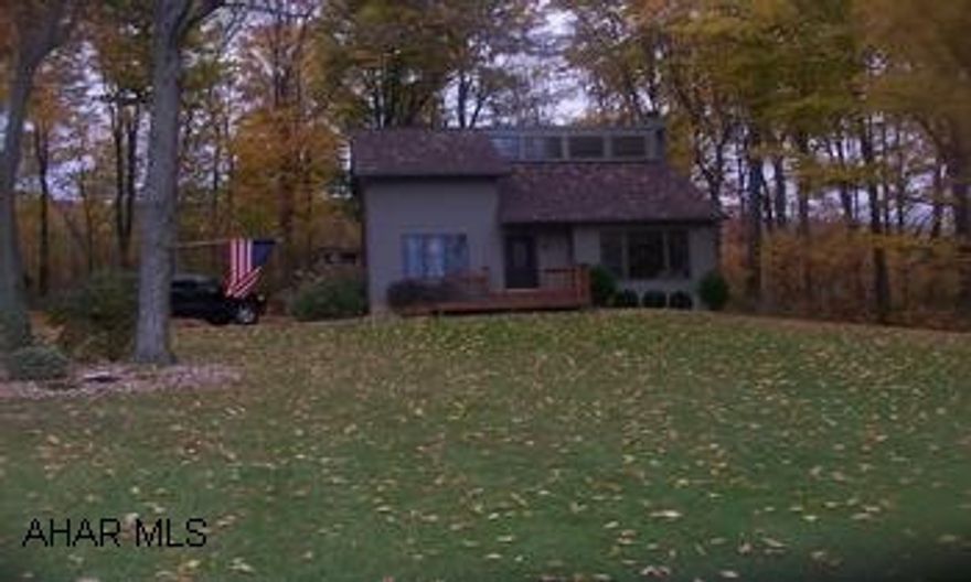 Lovely Spacious 2 bed 2 bath contemporary on 1.94 acres.  Solid oak trim and flooring.  Tile galore.  Finished family room in basement.  Loft could be 3rd bedroom used as den.  Large deck, detached garage with additonal 2 stall barn and corrals. Lovely Spacious 2 bed 2 bath contemporary on 1.94 acres.  Solid oak trim and flooring.  Tile galore.  Finished family room in basement.  Loft could be 3rd bedroom used as den.  Large deck, detached garage with additonal 2 stall barn and corrals.