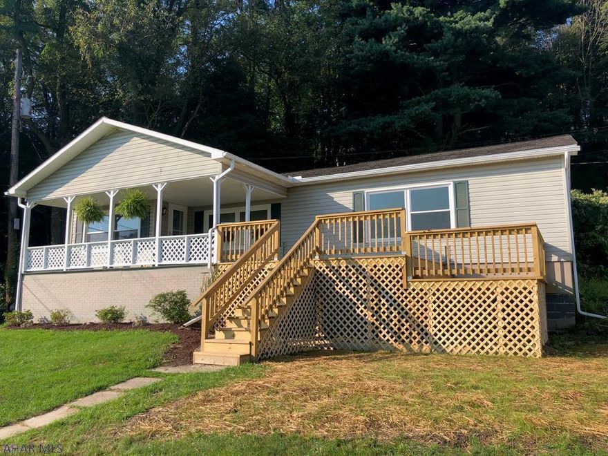 This one story home makes living easy!  With a HUGE picture window facing the front, there is ample natural sunlight and views. Enjoy mornings or evenings on your partially covered porch, or inside the living room curled up by the fireplace. This home features 3 bedrooms, 1 bath, main floor laundry, and an oversized 2 car garage with workshop.  The large yard and porch give plenty of space for outdoor entertaining on this almost 1/4 acre lot! Don't miss this little gem right in the middle of Toy Town. Call today for your private showing.