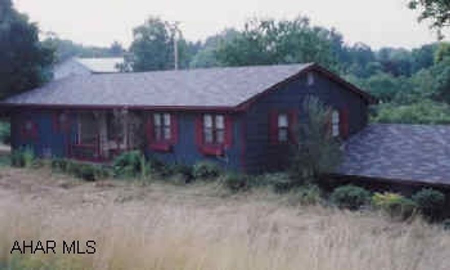 3 bedroom ranch house with 1 bath. Large garage, deck, patio, paved driveways.  Kitchen appliances included. Bank owned.