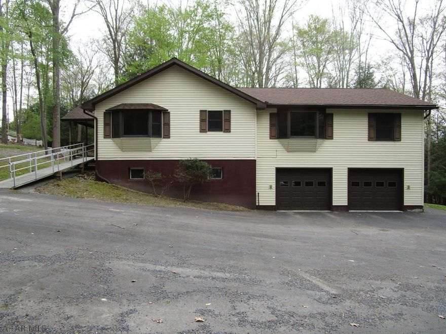 Located on a quiet dead end street in the gated community of Glendale Yearound.  Lots of space in this one level home with a handicap entrance.  Four bedrooms, multiple heating zones, front porch and deck off of the extended living room.  Situated in the woods where you can watch the deer from your window or deck.  Basement has a full kitchen and could be made into an apartment.  Two car garage.  Laundry is on the main level.