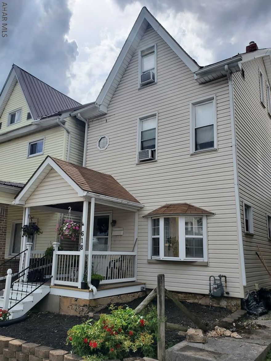 $1,500 remodel credit with full price offer! Add your personal touches to this Bell Avenue single family home to make it your own. A newer roof, newer kitchen, and newer main level half bath; this home is ready to move in while adding your finishing touches to make it your own. With a finished attic, enclosed back porch, eat in kitchen area, and off street parking, you will have no shortage of living and entertaining space. Owner is looking to downsize quickly but will continue to make aesthetic improvements up to closing. This family home created many great memories for the owners over the years and is now ready for you to start creating your own.