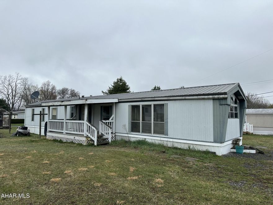 A fixer upper investment home! 14x70 1989  Astro singlewide.  2 bedroom 2 bathrooms, newer metal roof. AS IS WHERE IS.  The buyer will need to be approved with the park owner with application.