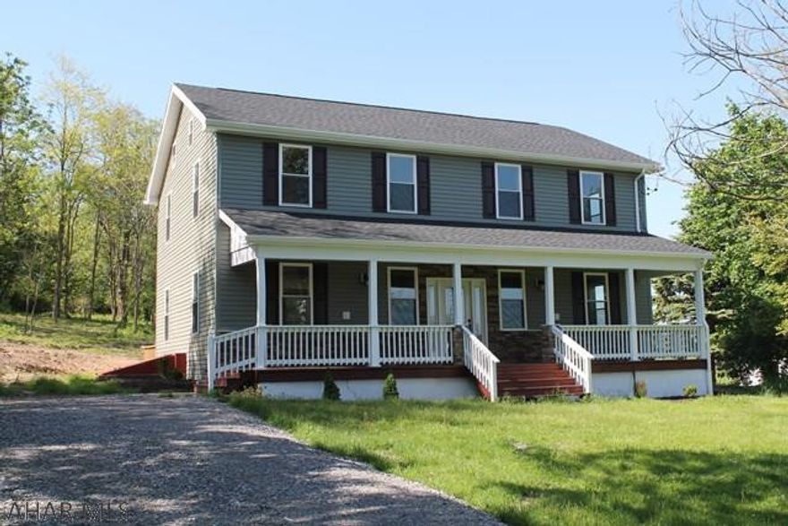 Completely renovated large home on 1 acre in Ore Hill area of Roaring Spring. 4 Bedroom, 2 1/2 bathroom home with all new windows, siding, roof, drywall, flooring, kitchen and bathrooms. The cabinets, crown moldings, and baseboards are all custom made. Large island in kitchen and open concept through out. New furnace, electric, and inside well pump.