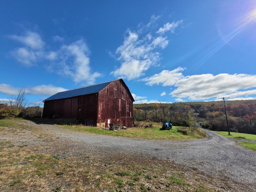 Beautiful piece of land for you to build a farmette or use for recreation with an old existing barn. This parcel is approximately 25 acres (TBD by survey) part of the property is cleared off near the barn, while the other acreage is going up the ridge wooded, perfect for hunting. The barn is sitting on the edge of the property and may be restored for use. Access to property off private road. Please refer to MLS 62262 for additional ground for sale. Please call listing agent for more information.