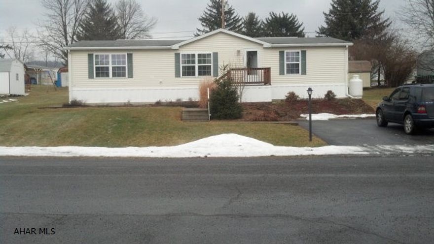 Beautiful 2001 Double wide. This unit is on a sold foundation and tied down. This unit has a huge sun room off of dining room. Very large rooms with private laundry area. Lot rent is $260.00 a month and includes sewer in lot rent. No dogs allowed. Buyers must be approved by continental courts