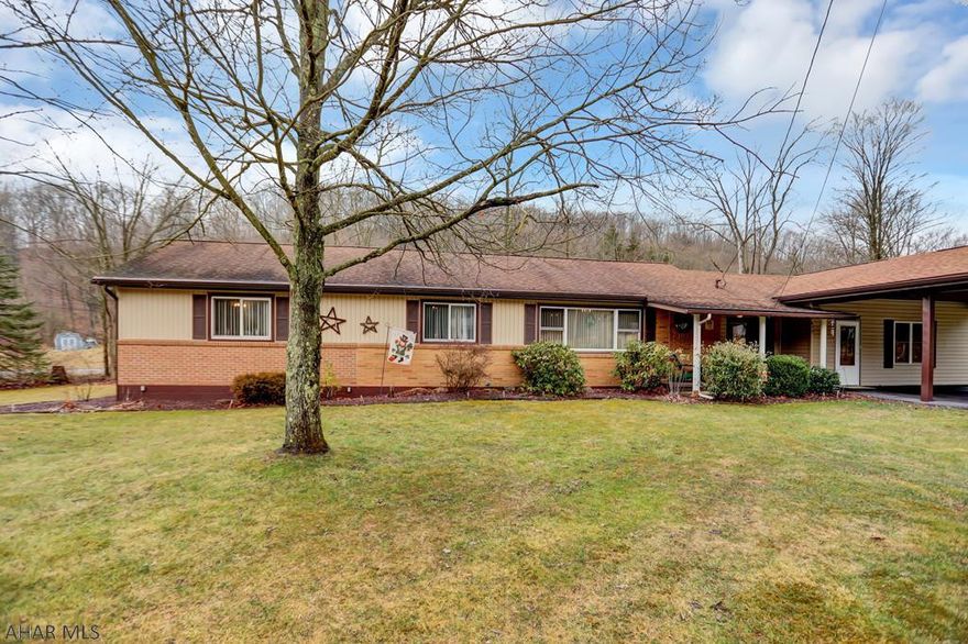 GREAT LOCATION!!! This 3 bedroom, 2 bath house is a great find! Inside features beautiful hardwood floors, spacious kitchen with lots of cabinet and counter space, and a large master bedroom. The finished basement is perfect to spend time with family and friends. There is also an In-Law suite with a full bathroom. Outside you'll enjoy relaxing summer evenings on the back deck, complete with a hot tub. There is also a nice size yard, large shed, off street parking and carport. This house is a MUST SEE!!!