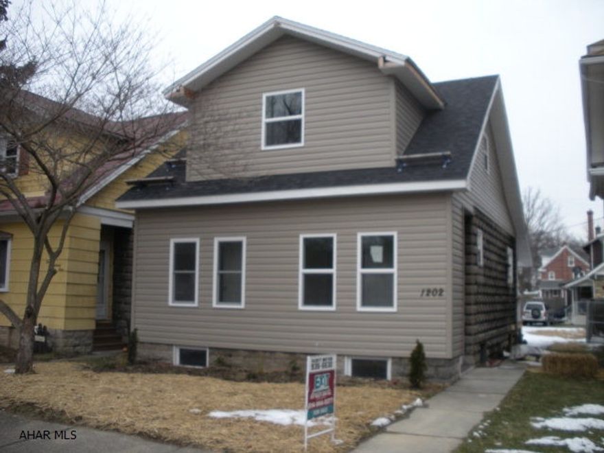 Beautifully renovated 3 bedroom, 2.5 bath home.  Everything is new, wiring, plumbing, insulation, drywall, etc.  All new white cabinet kitchen with marble counter tops.  Stainless appliances, hardwood floors. 1st floor laundry and 1/2 bath.  New Master bath, new guest bath, new windows, roof, siding, doors and new recessed LED lighting.  Too many updates to mention.