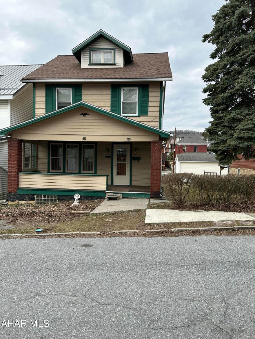 Cute and cozy three bedroom. Garage with storage area in the back for off street parking. Cozy front porch for the evenings. Most windows have been replaced by Window World and the lifetime warranty transfers to the new buyer. Walk up heated attic could be additional bedroom or storage.  Newer furnace, roof, and metal garage roof.
