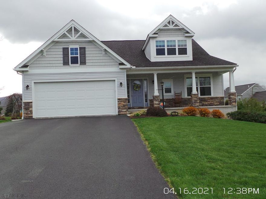 Large Master Suite on first floor plus 2 additional bedrooms and full bath.  Second floor offers 1 BR, full bath and large loft / Bonus Room.  Beautifully landscaped lot with cement patio and porch and great view.  Move in condition.