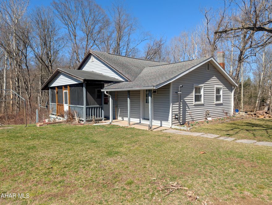 Discover this charming three bedroom, one bath home nestled along the Raystown Branch of the Juniata River,  a well known stocked trout stream.  This home features a comfortable  layout with room for relaxation and entertainment. Located minutes from Shawnee Lake, this property is an ideal fishing getaway, primary residence or potential investment property. Enjoy the serene natural surroundings while being conveniently close to recreational activities. The proximity to the river provides opportunities for outdoor adventures and tranquil moments by the water.  Create your own oasis. Located just a short drive to Historic Downtown Bedford where you will find unique shops and fine dining. Also close proximity to Blue Knob Ski Resort. Call today for you personal tour!