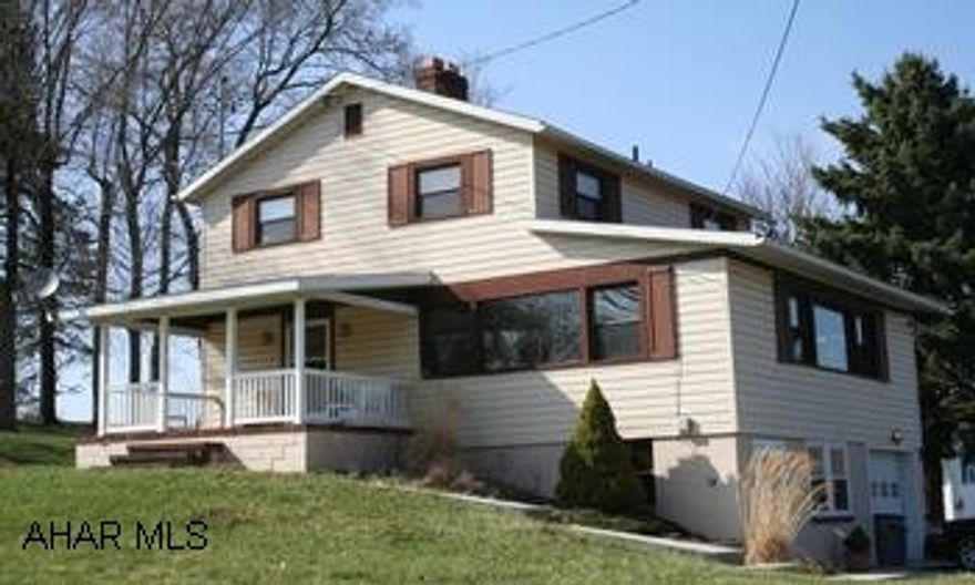 Vinyl-sided 2-Story home close to town. Has privacy and view! MANY UPDATES, call for more information.