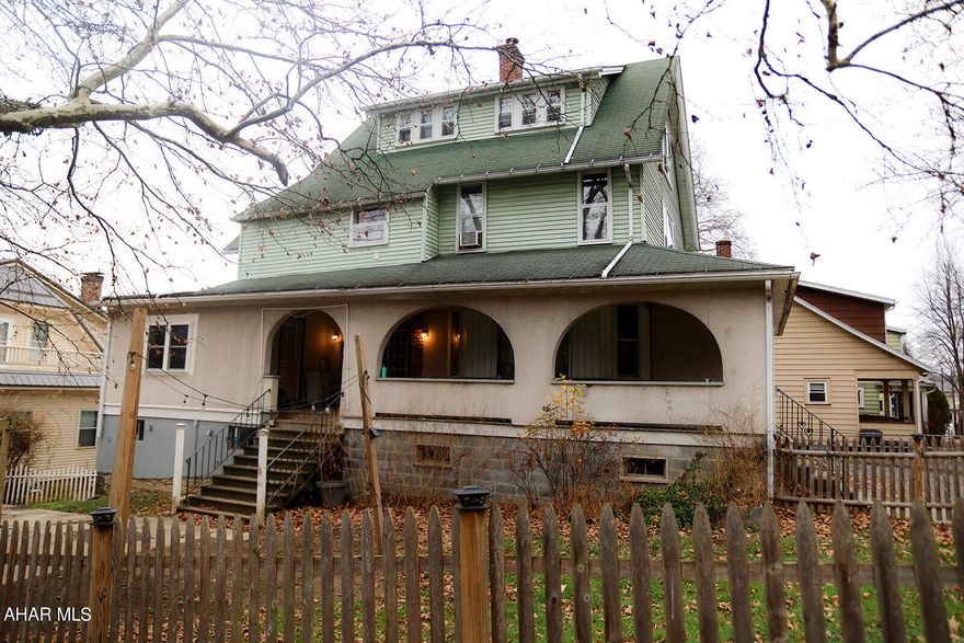 Discover your dream home! This stunning 5-bedroom, 3-bath house exudes character and charm. The fully renovated master suite on the main floor is a true gem. Enjoy the convenience of 2 laundry rooms, a delightful sunroom, and a spacious front porch. Located near the hospital and Juniata College, this property offers endless potential. Don't miss out on this unique opportunity!'