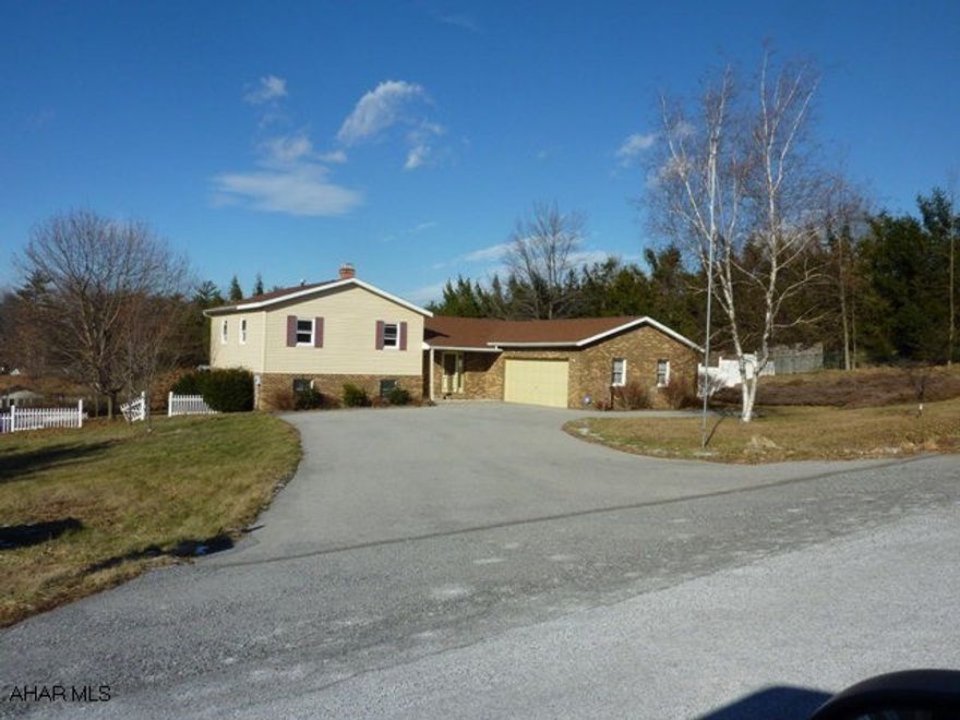 Great opportunity in Bellemeade!  This 3 BR multi-level offers a large fenced yard, oversized 2 car garage, eat-in kitchen, and huge family room.  A lot of house.