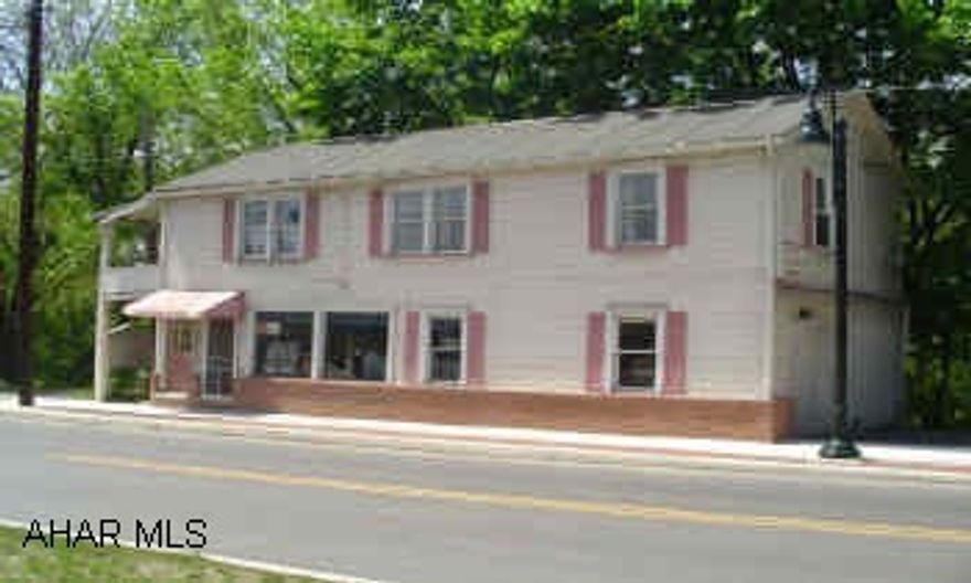 Building with storefront and 1BR apartment on 2nd floor- Business not for sale - Bldg only