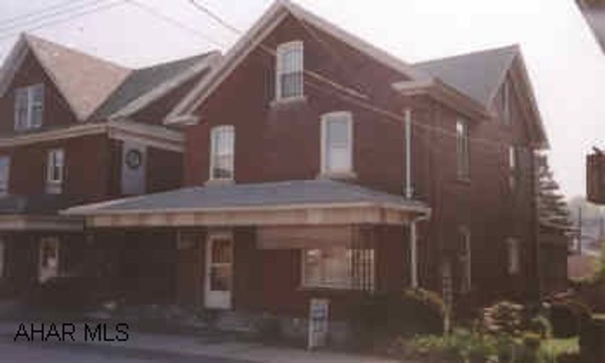 ALL BRICK HOME WITH A PRIVATE SUNPORCH. THIS LARGE HOUSE FEATURES MANY UPDATES AND LOTS OF ROOMS. COULD BE DUPLEXED EASILY. NEWER FOUR CAR GARAGE IN REAR. A MUST SEE! 22W TO GALLITZIN EXIT, LEFT PAST STOP SIGN AT SUGAR RUN , LEFT TURN ONTO PORTAGE STREET, RIGHT OVER BRIDGE TO MAIN STREET.