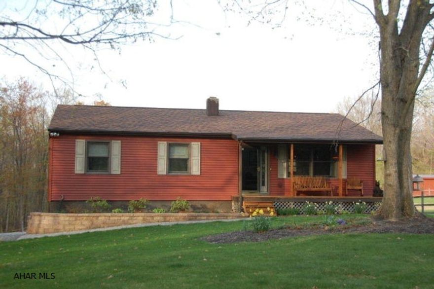 Beautiful 20 Acres Property . Barn can hold 5 horses, 3car garage with loft, 3 bay shed for tractors. Very well built ranch 3 BR and 3 BA. Hardwood floors in LR and DR. Ceramic in Kitchen and Baths. Sit on the deck and enjoy the view and pond or ride your horses in privacy.