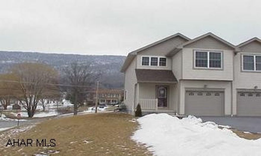 Terrific townhouse across from Scotch Valley Country Club.  Includes 1-year membership to Club!  3BR, 2.5 BA Hardwood and ceramic floors.  Cherry kitchen.   Bright corner unit on large lot.  Nice open floor plan.  Great views!  Hardwood floor in great room.  Porcelain tile in kitchen and baths.  Includes 1-year membership to Scotch Valley Country Club!