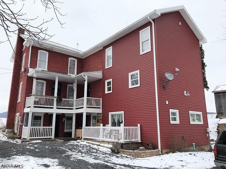 This absolutely scenic farm is tucked away in its rolling fields with peaceful mountain views. Resting on 125.69 acres with 80 tillable, 14 fenced pasture and the remainder wooded, a tranquil stream and spring fed pond. The recently updated and remodeled from top to bottom farm house has a LR, FR w/ fireplace, DR open to the kit and sun porch, kit with granite counters and island, and a 1/2 bath on the main level. Second level features a m. bed with walk-in closet, two additional bedrooms, laundry room and 2-full baths. Full finished basement with a rec room, game room, office and another full bath. Basement is walk-out to ground level. Heat pumps with central air, propane forced air and a rice coal burner. Huge 73' x 83' bank barn, machine shed, summer cottage and other outbuildings.