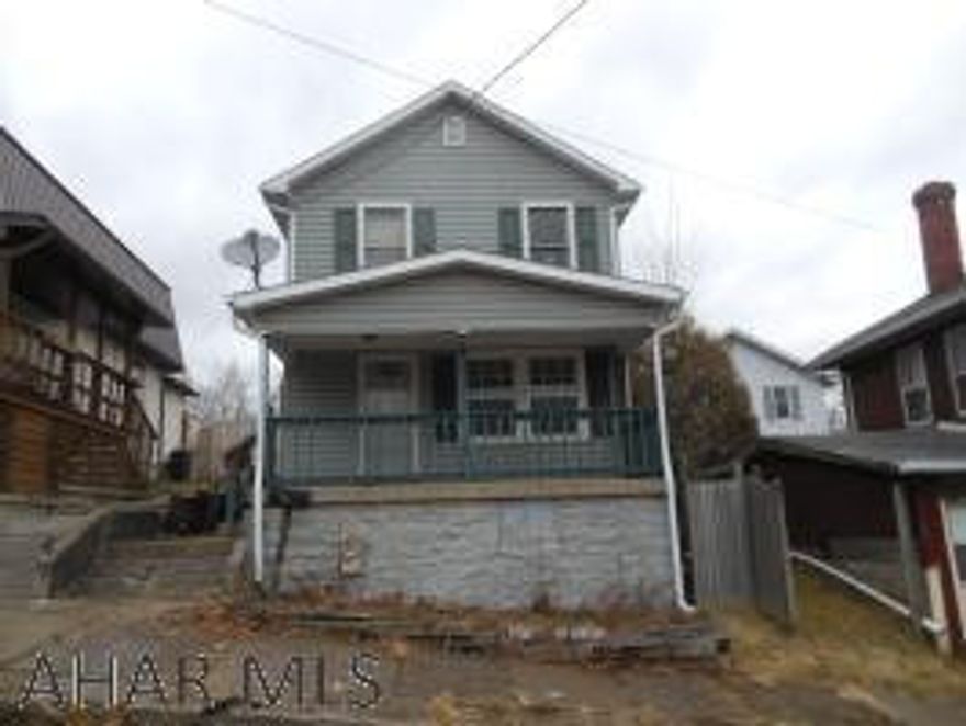 This is a two story home in Juniata. This home has a front porch and rear deck. The main floor has a living room, dining room and kitchen. The second floor has two bedrooms and a full bath. With some custom touches, this house could be your home